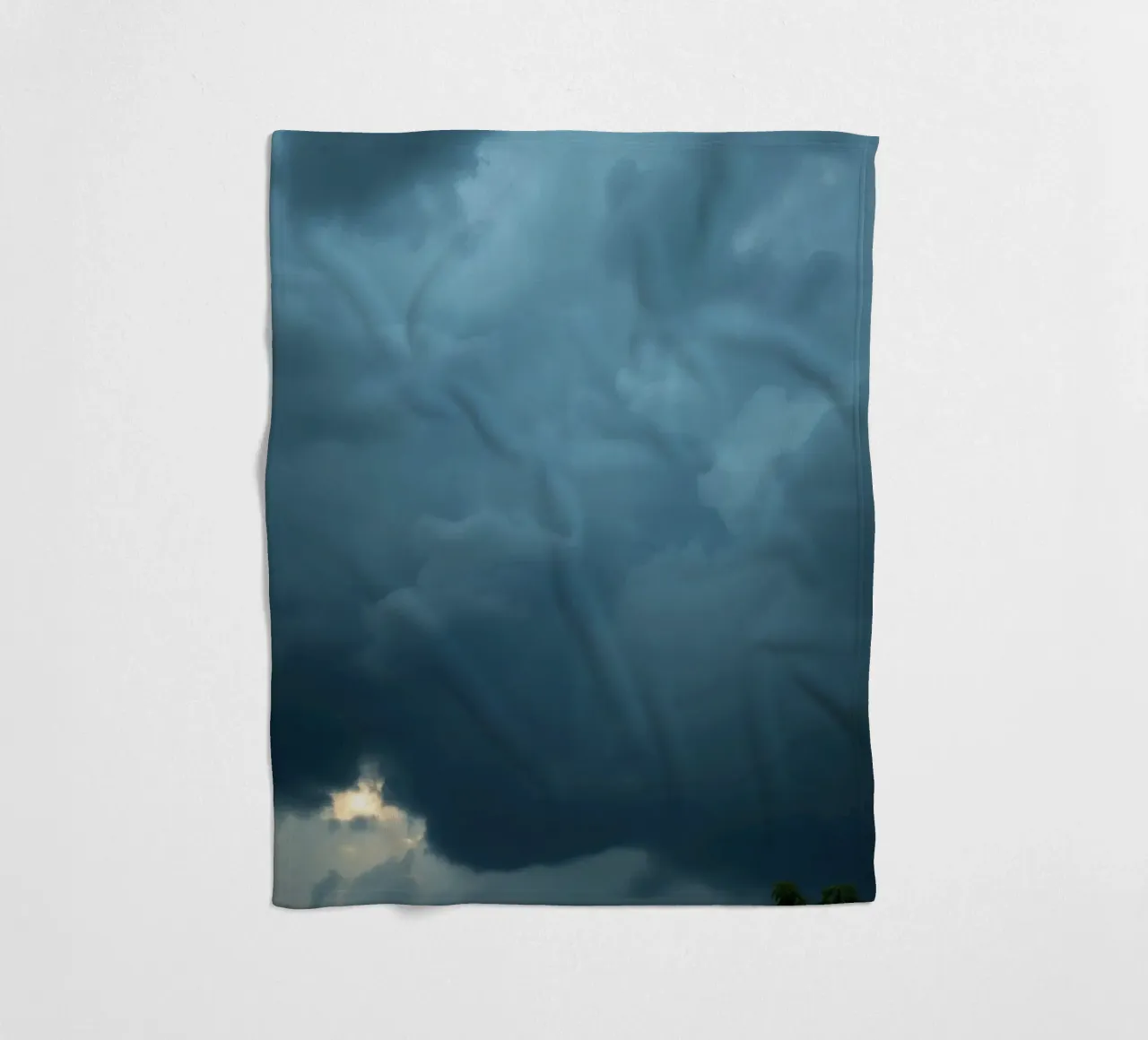 Dark and moody clouds gathering in the dramatic sky fleece blanket by DesignDoodle