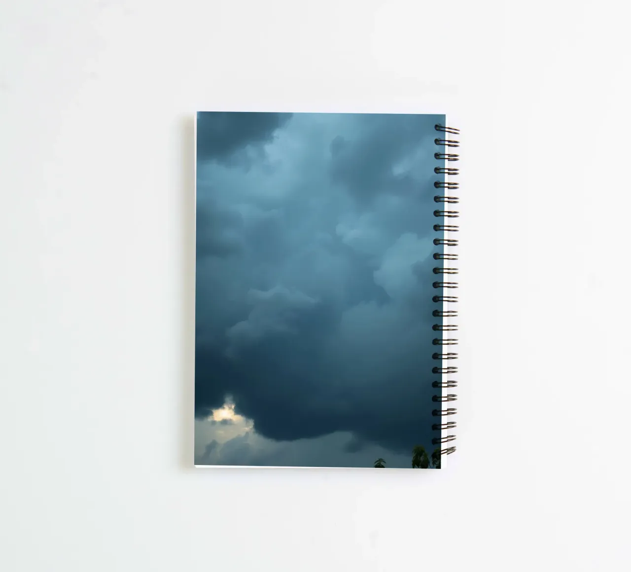 Dark and moody clouds gathering in the dramatic sky spiral notebook by DesignDoodle