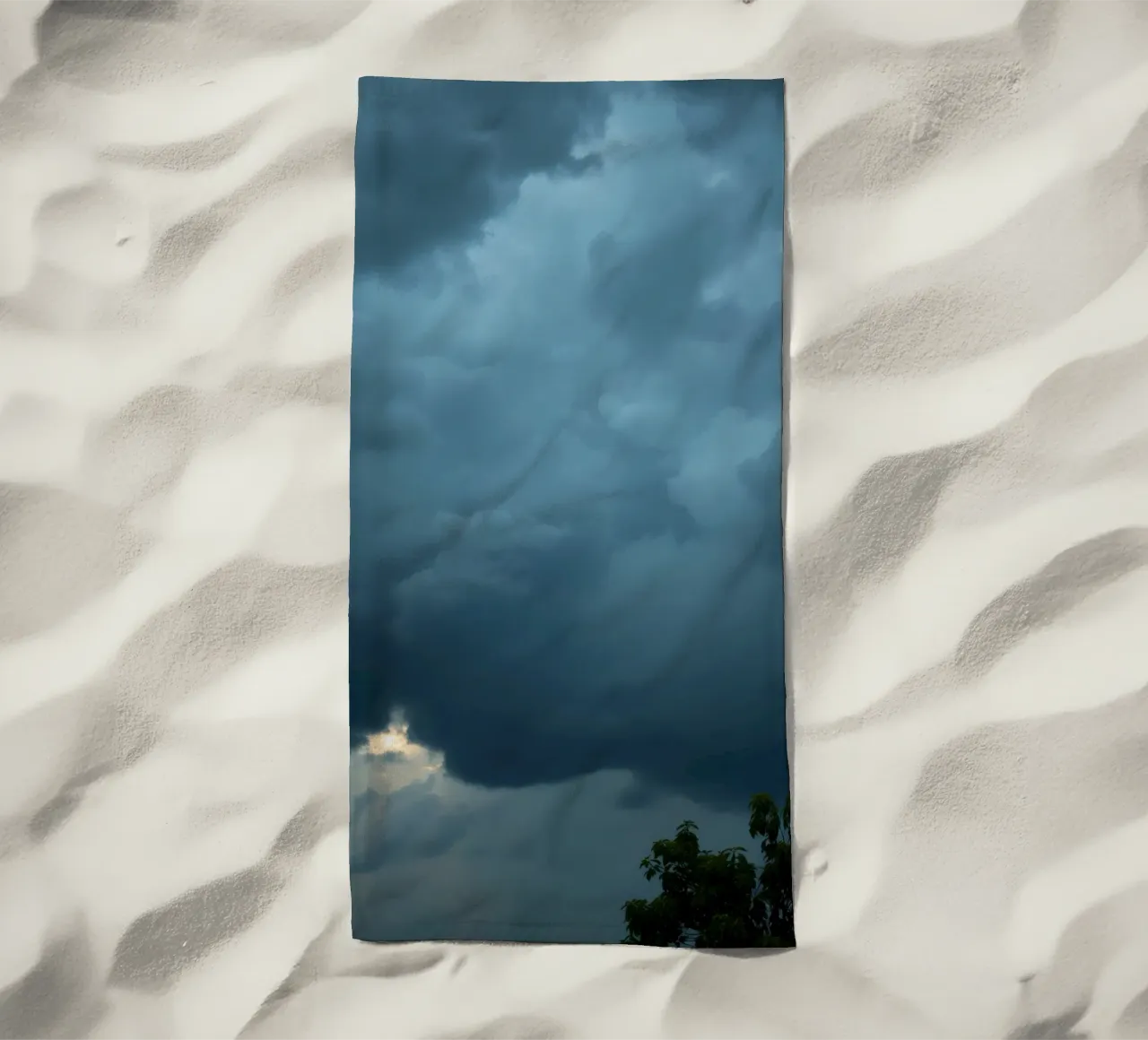 Dark and moody clouds gathering in the dramatic sky beach towel by DesignDoodle