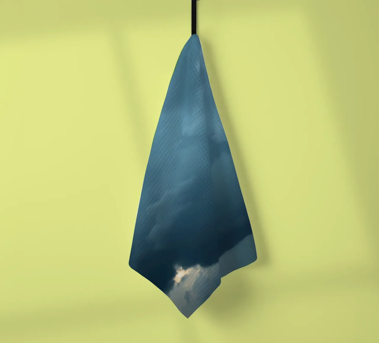 Dark and moody clouds gathering in the dramatic sky tea towel by DesignDoodle