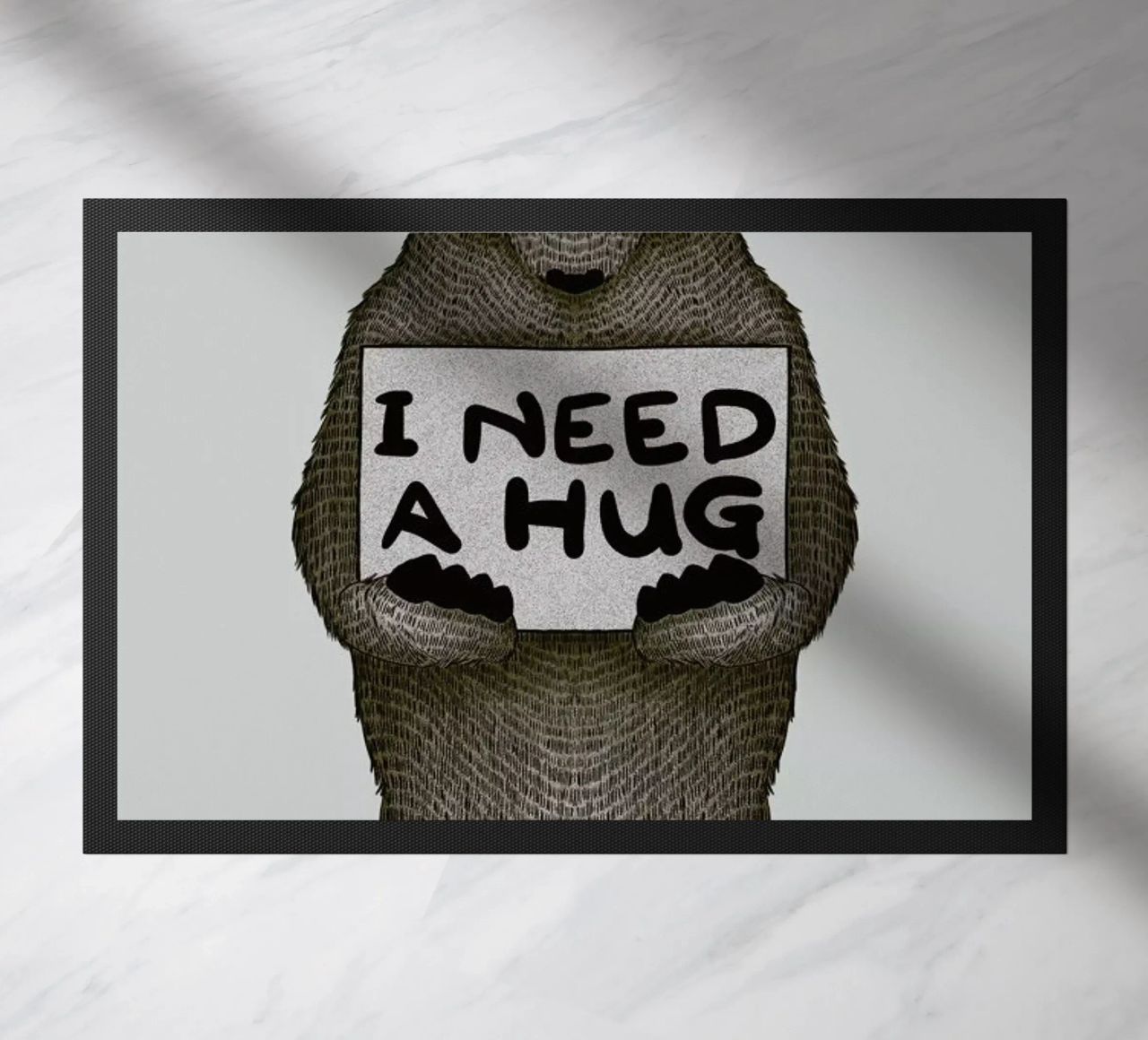 I Need a Hug doormat by Tobe Fonseca
