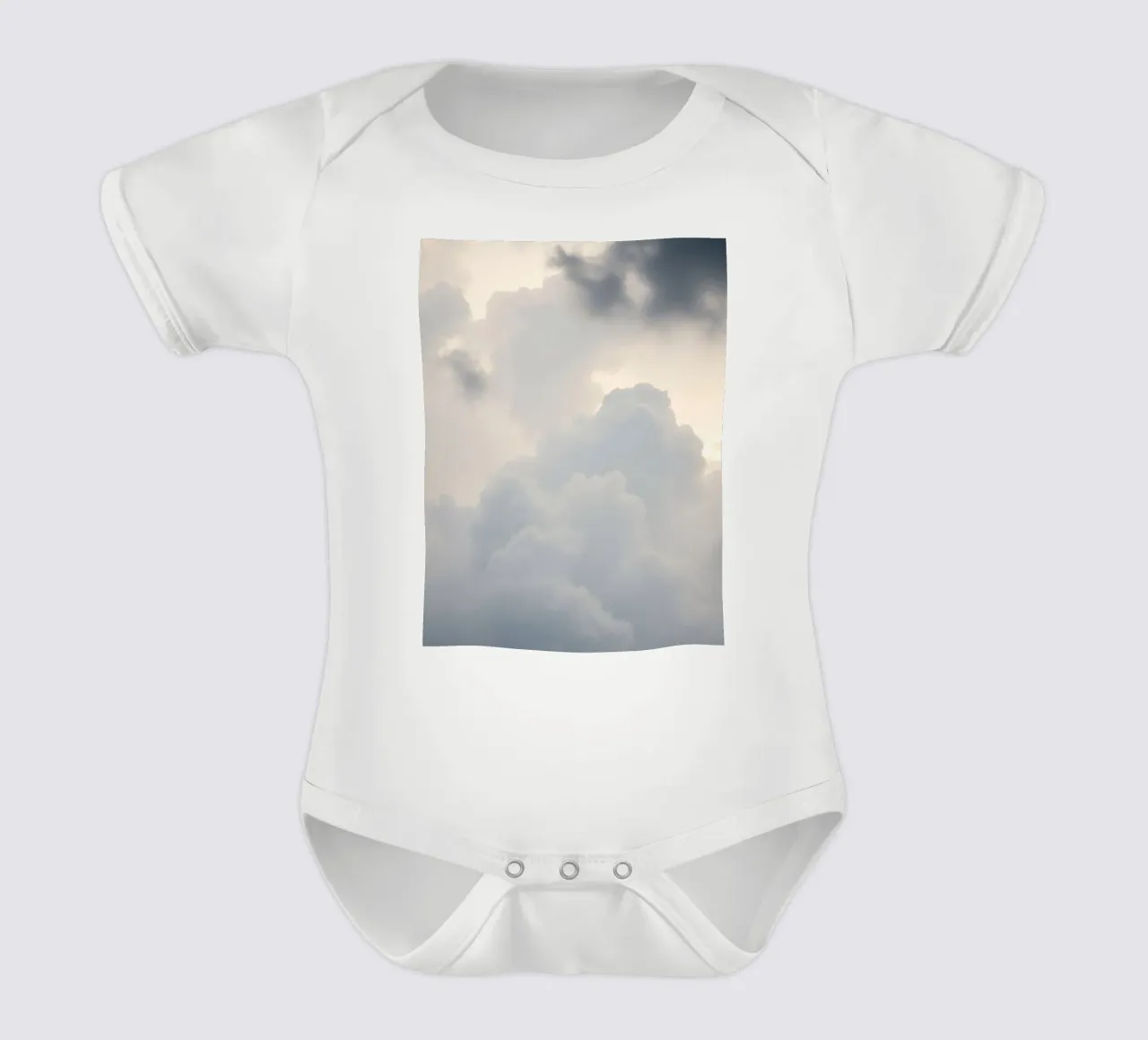 Sky filled with soft clouds and light hues a calm and sooth short-sleeve baby romper by DesignDoodle