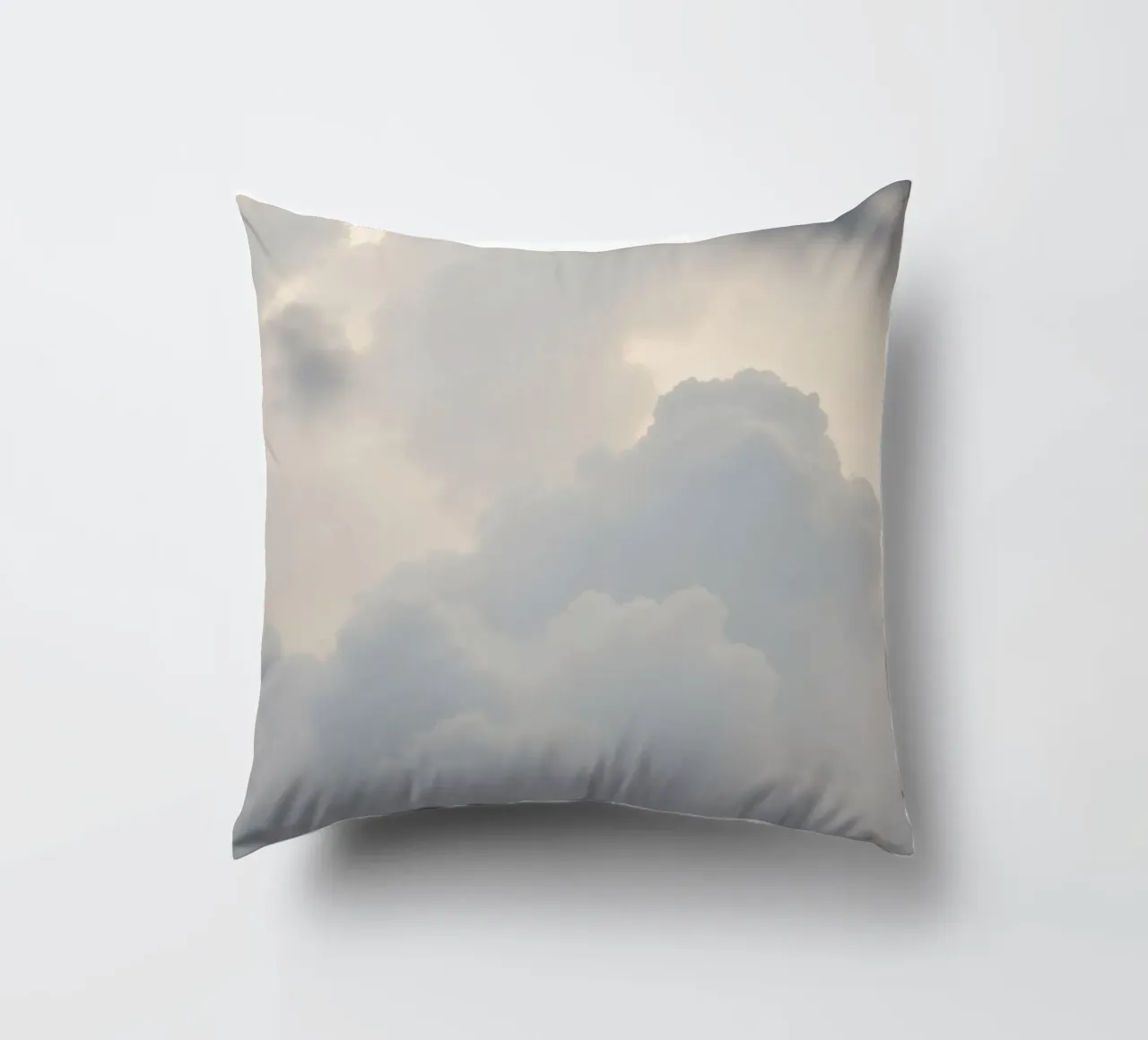 Sky filled with soft clouds and light hues a calm and sooth decorative cushion by DesignDoodle