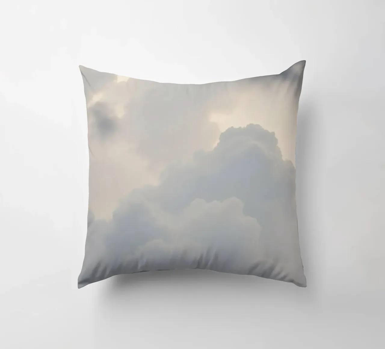 Sky filled with soft clouds and light hues a calm and sooth decorative cushion by DesignDoodle