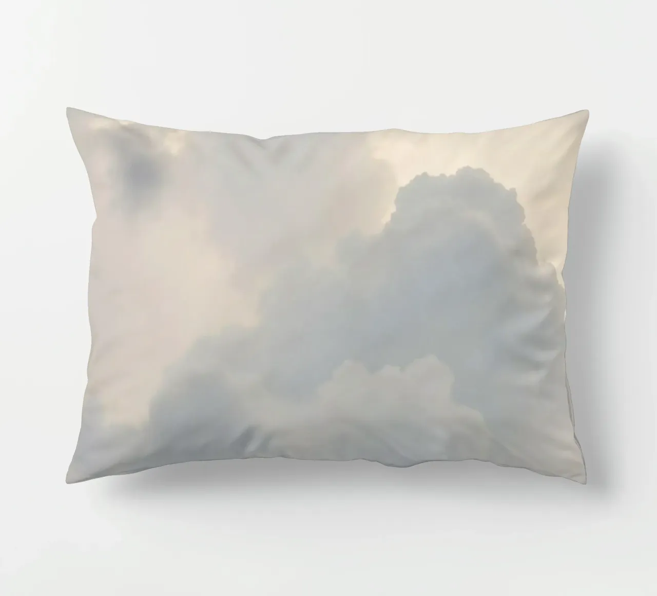 Sky filled with soft clouds and light hues a calm and sooth decorative cushion by DesignDoodle