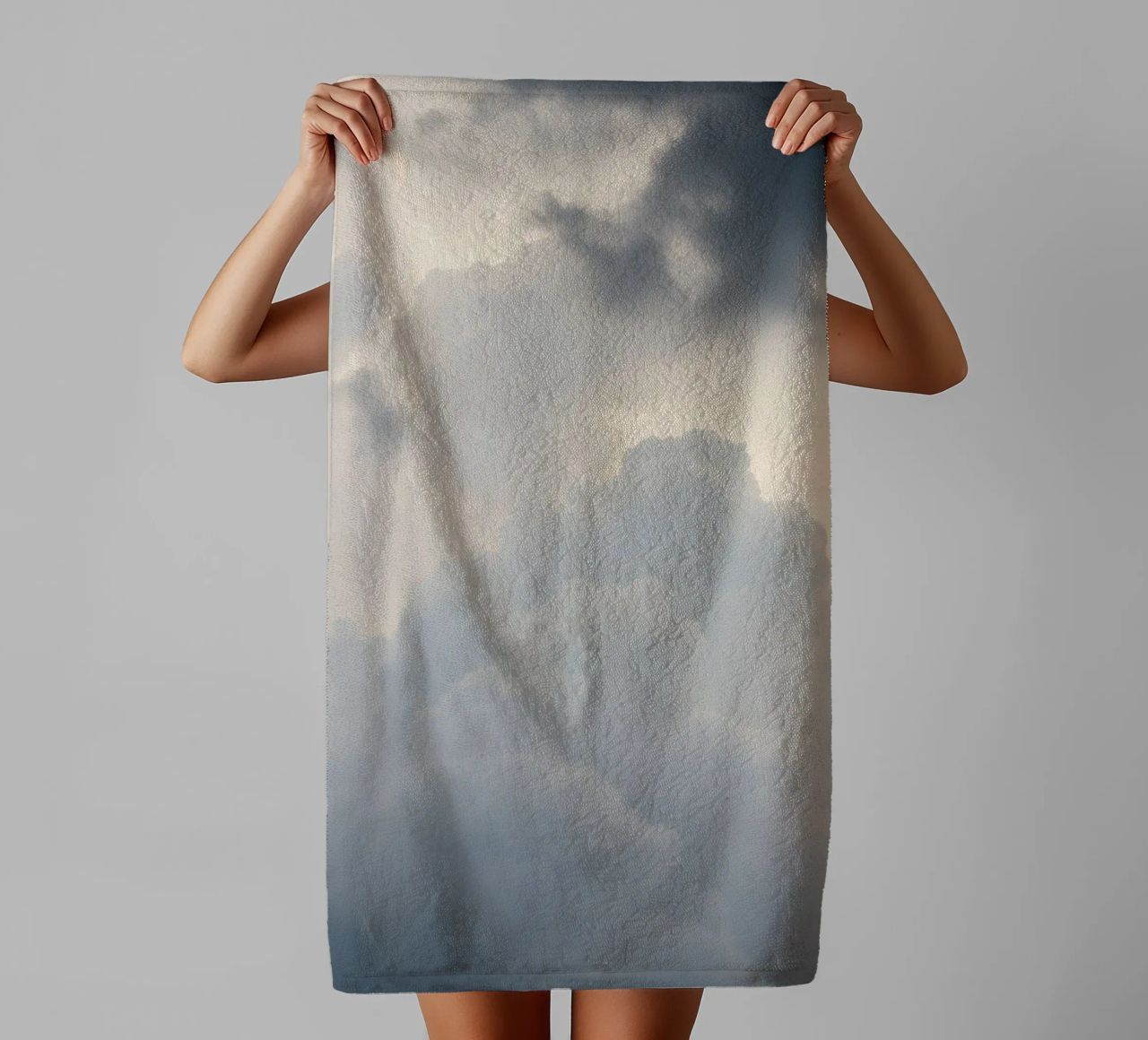 Sky filled with soft clouds and light hues a calm and sooth towel by DesignDoodle
