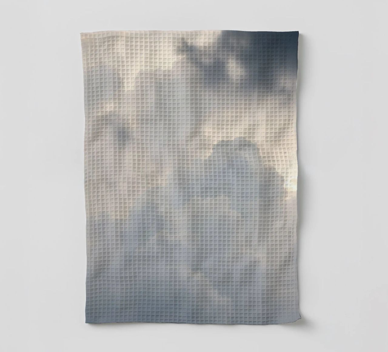 Sky filled with soft clouds and light hues a calm and sooth tea towel by DesignDoodle