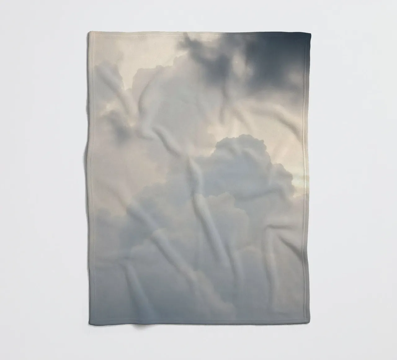 Sky filled with soft clouds and light hues a calm and sooth fleece blanket by DesignDoodle