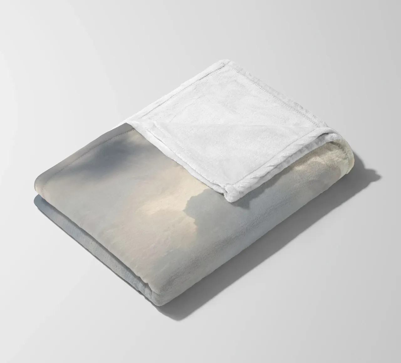 Sky filled with soft clouds and light hues a calm and sooth fleece blanket by DesignDoodle