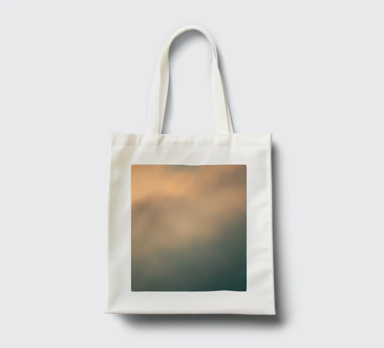 Soft abstract cloud pattern creating a tranquil tote bag by DesignDoodle