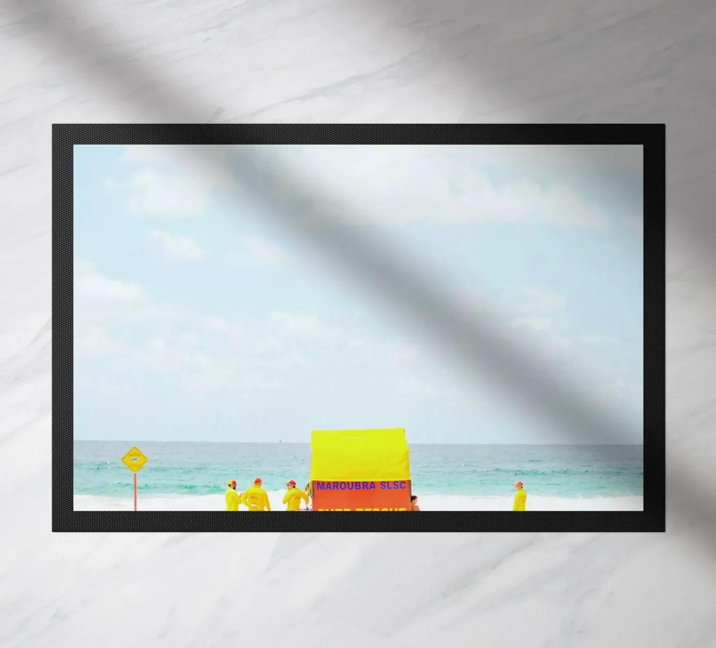 SLSC deurmat van Charlotte Curd