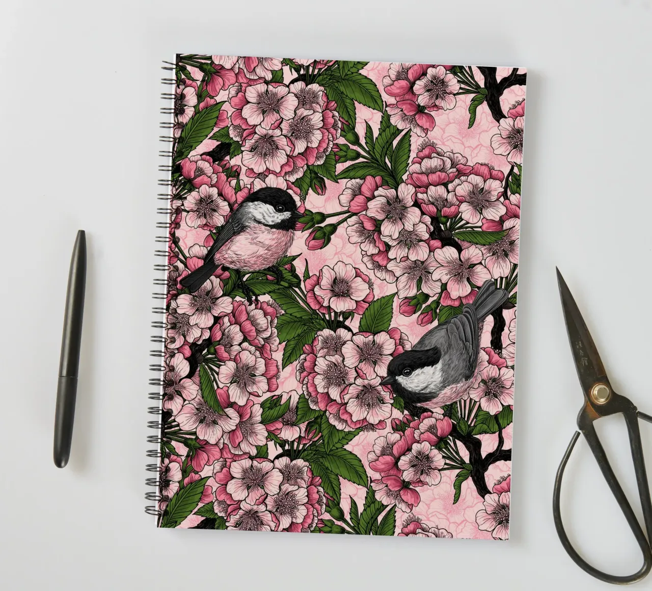 Cherry blossom and chickadees on pink spiral notebook by Painted Nature