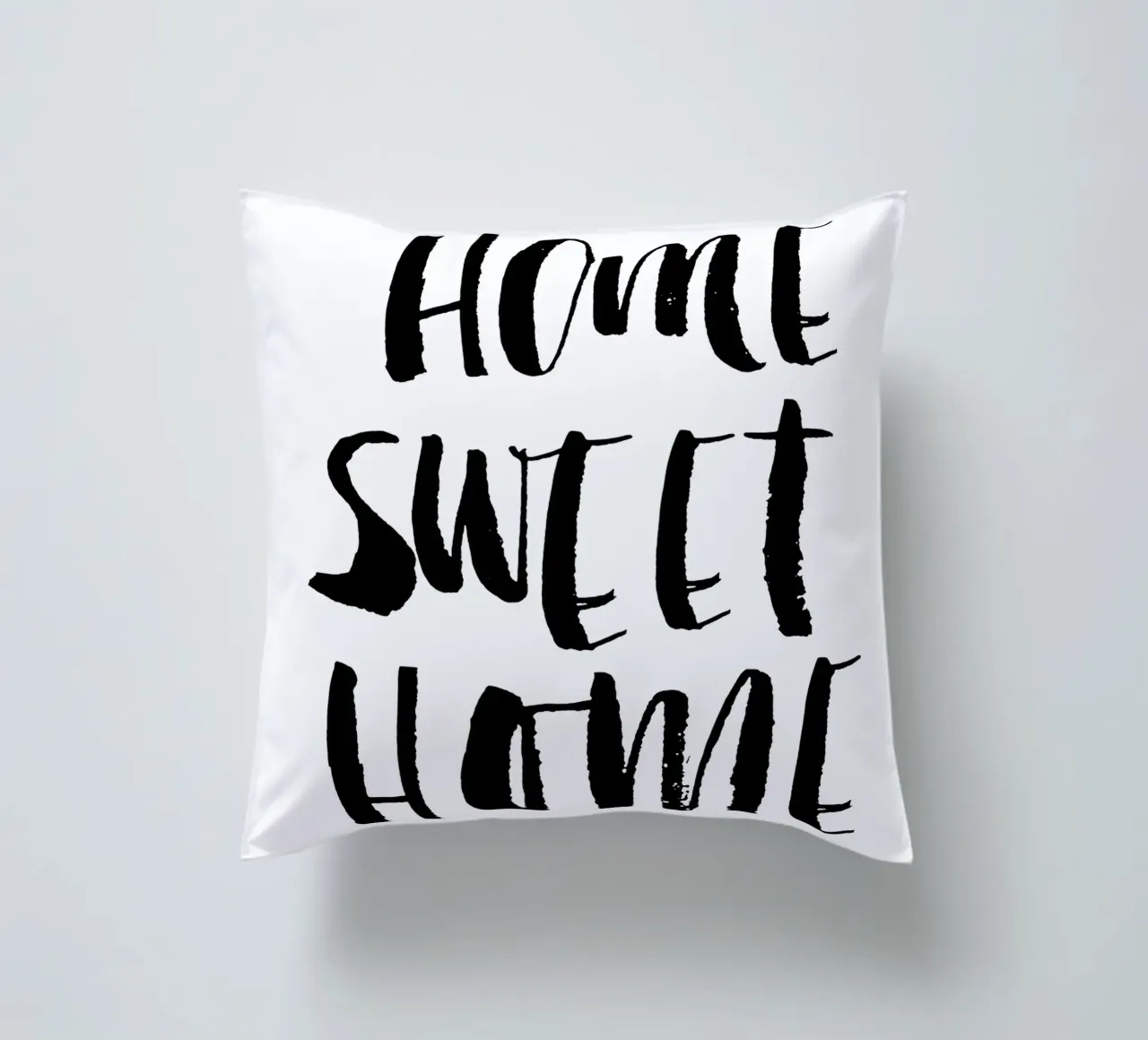 Home Sweet Home Design tipografico in bianco e nero cuscino da THE MOTIVATED TYPE