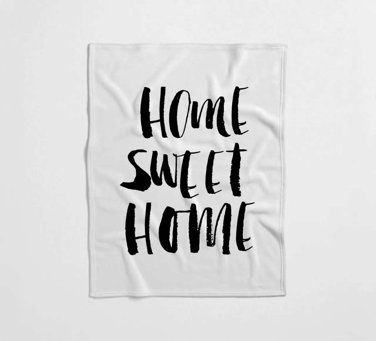 Home Sweet Home Design tipografico in bianco e nero coperta in pile da THE MOTIVATED TYPE