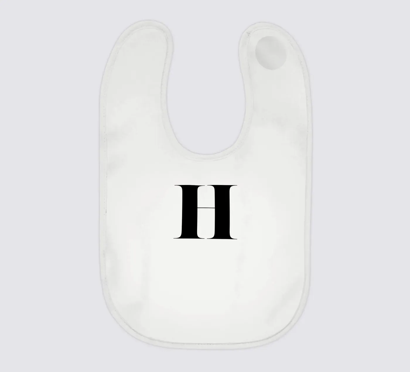 H bavoir de Mottos by Sinan Saydik