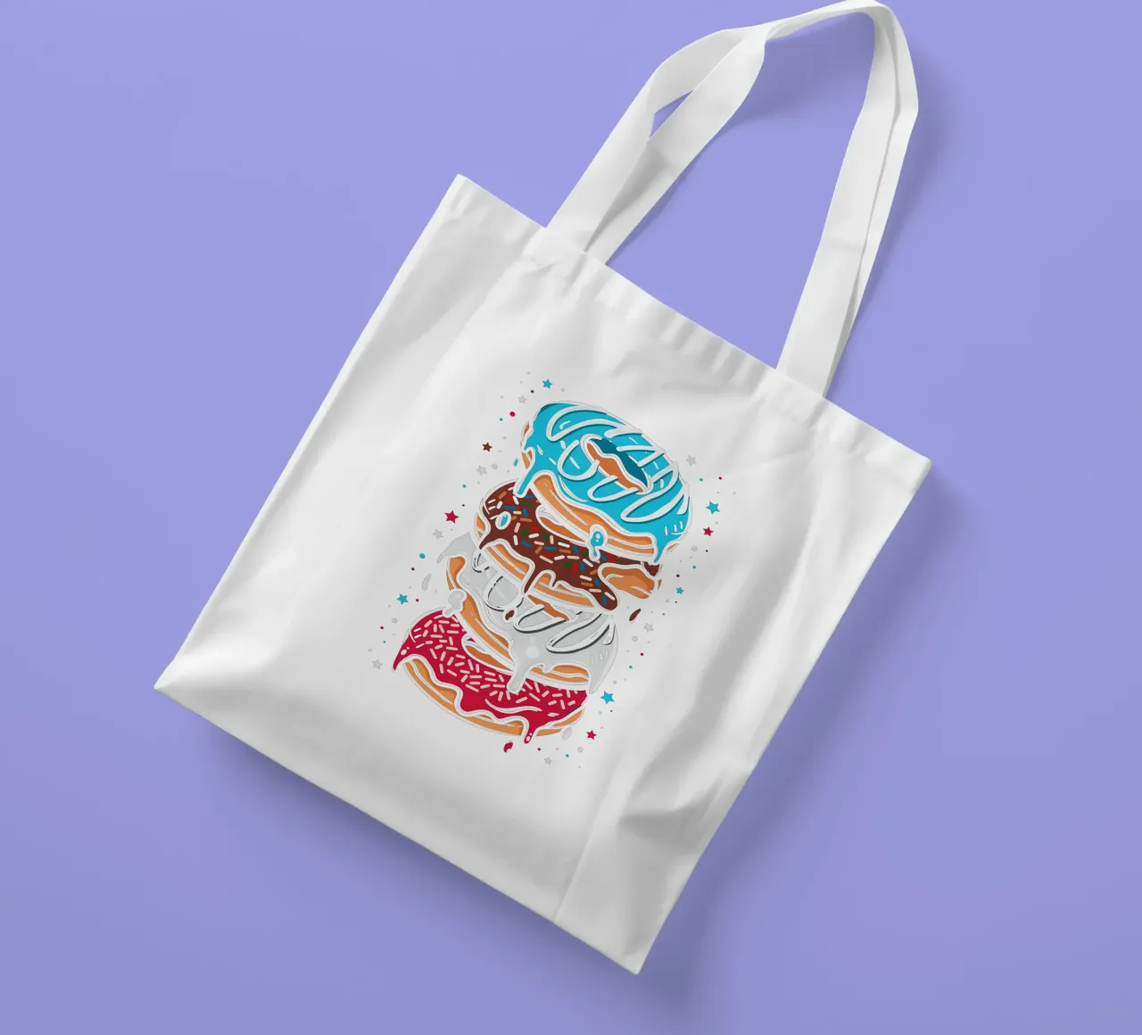 Stack of multi-colored donuts tote bag by LM2KONE