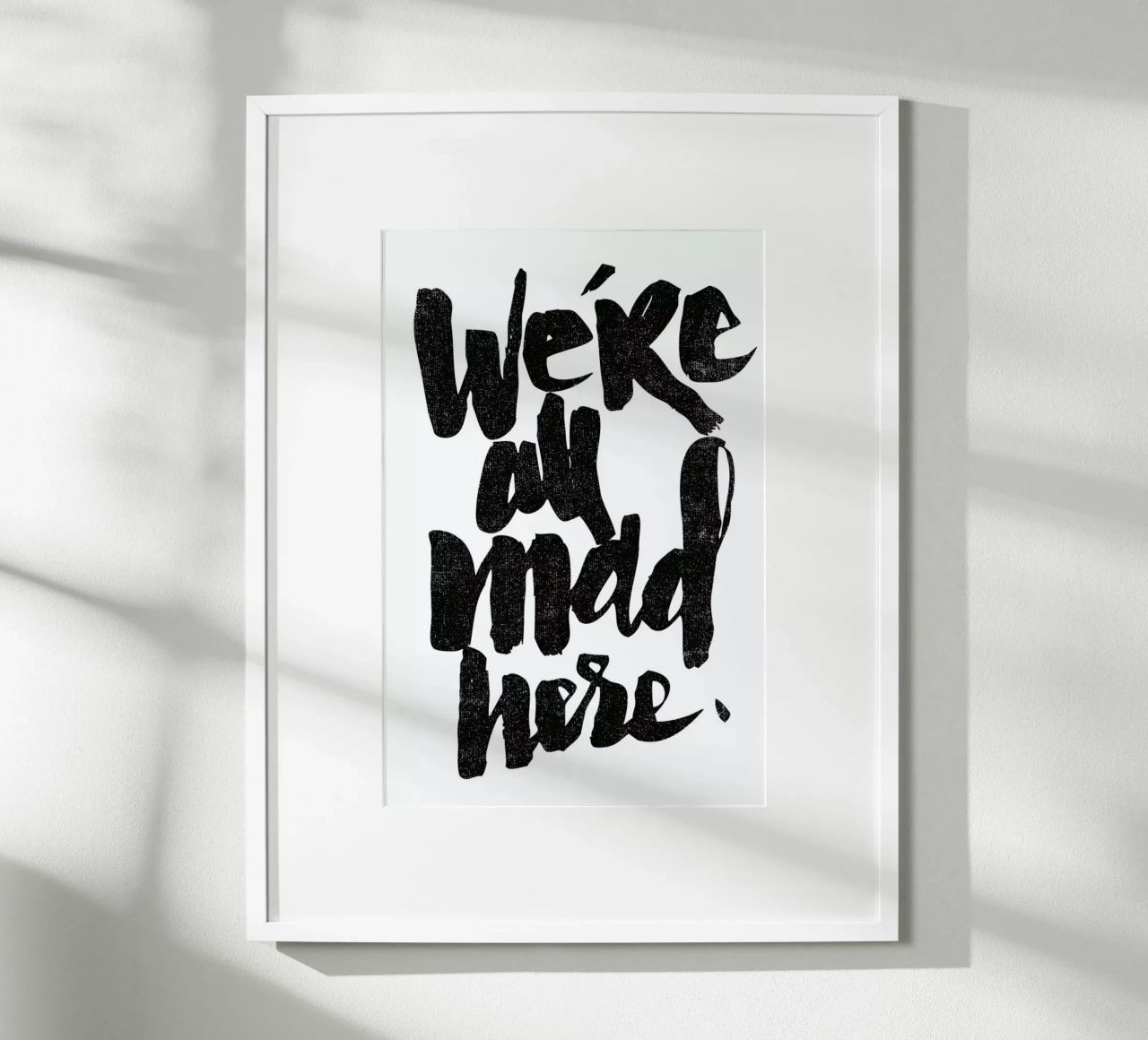 we’re all mad here poster con telaio in alluminio da Matthew Taylor Wilson