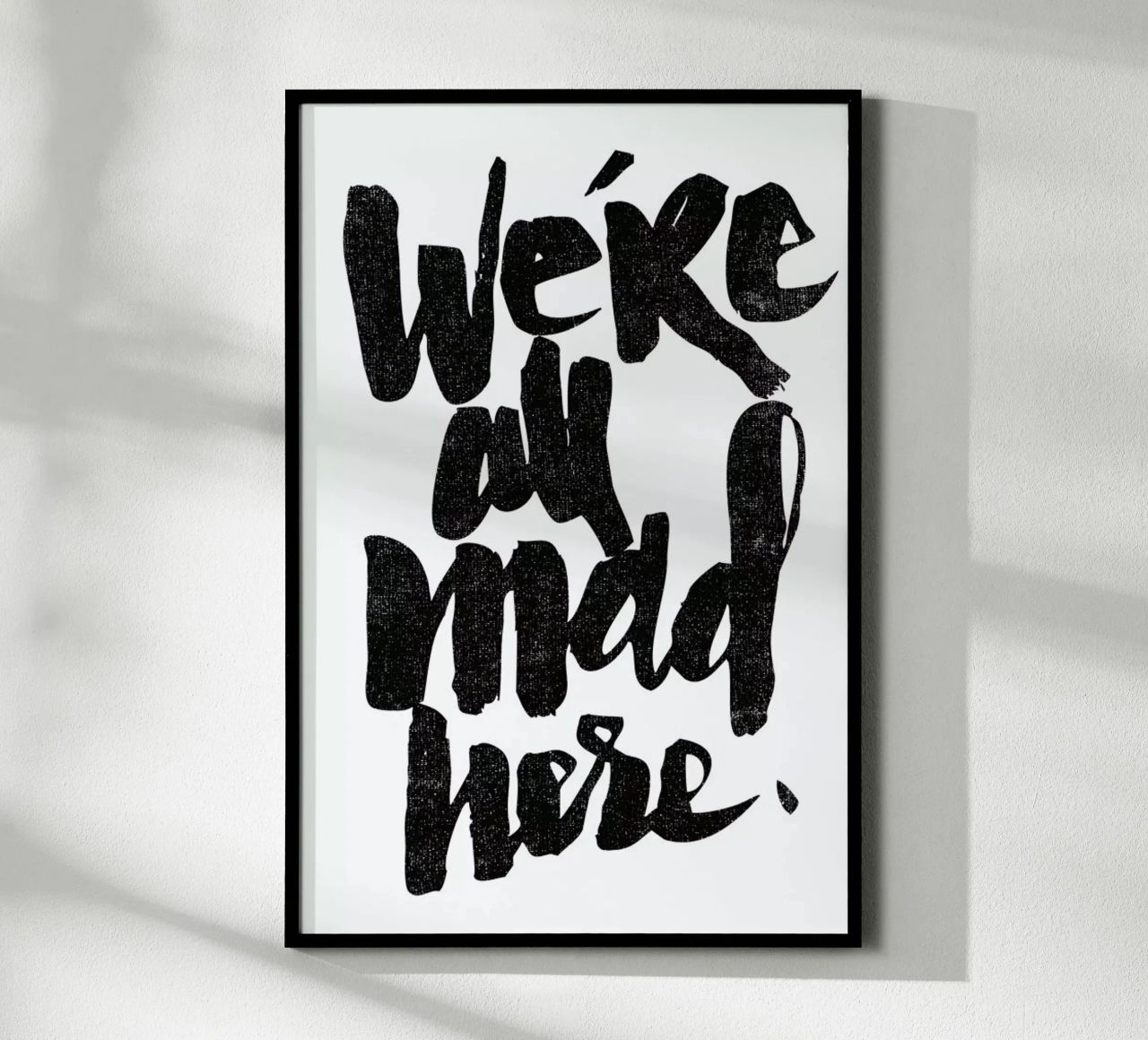we’re all mad here poster con telaio in alluminio da Matthew Taylor Wilson