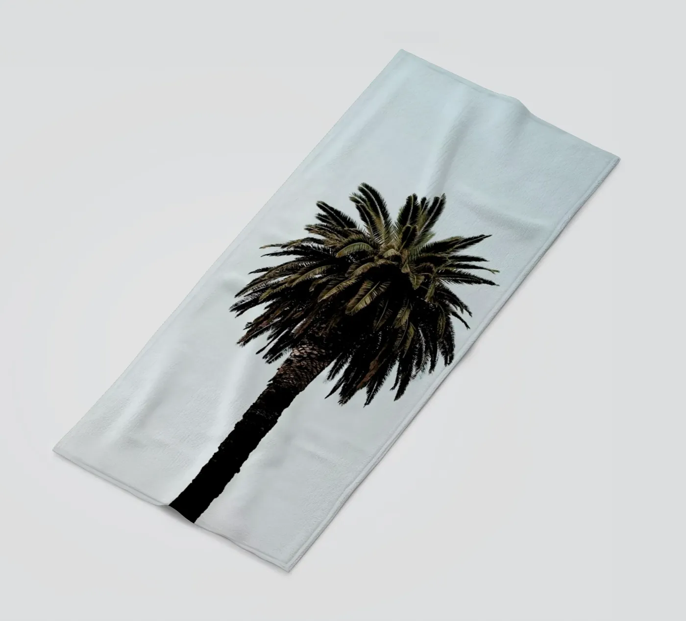 Palmtree beach towel by Laura Palm