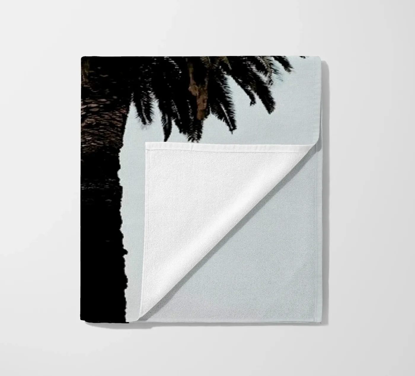 Palmtree beach towel by Laura Palm
