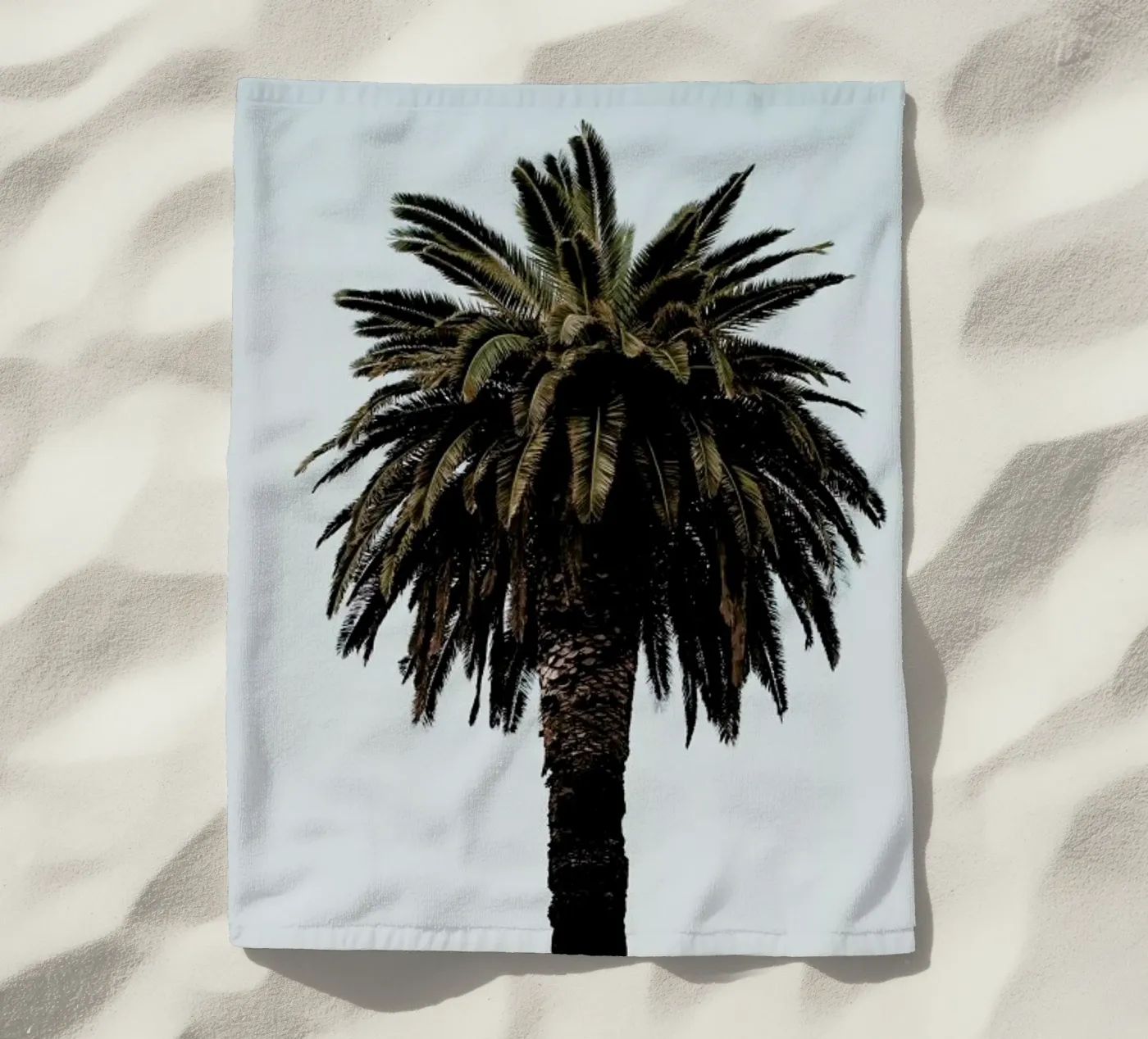 Palmtree beach towel by Laura Palm