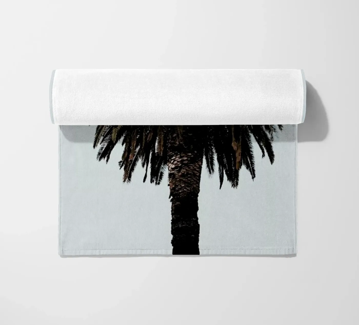 Palmtree beach towel by Laura Palm