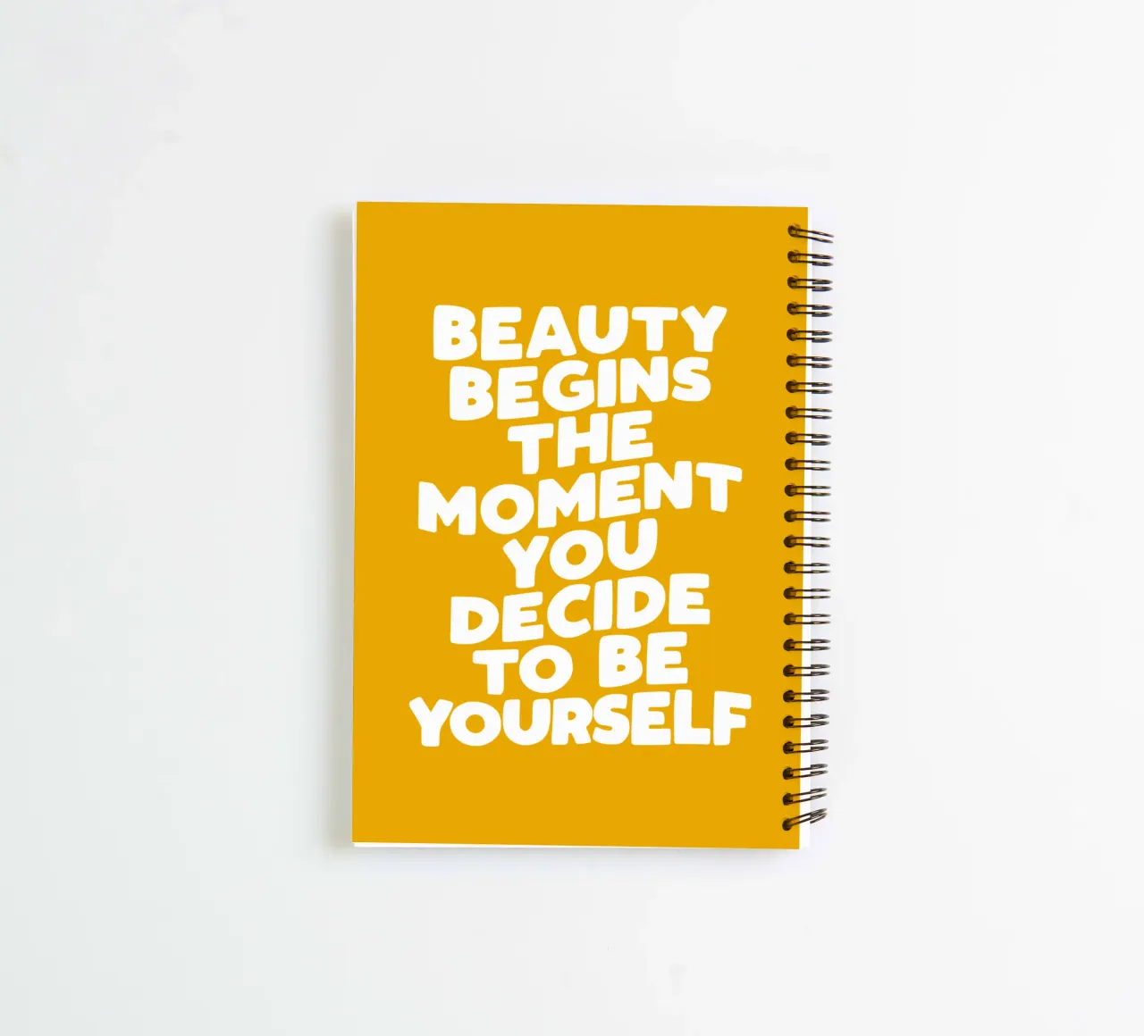 Beauty Begins the Moment You Decide to Be Yourself in Yellow spiral notebook by THE MOTIVATED TYPE