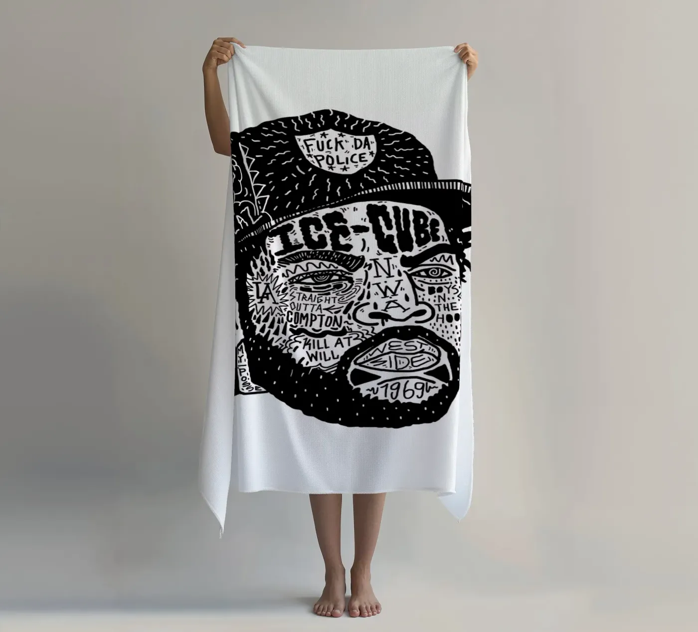 Ice Cube beach towel by Nick Cocozza