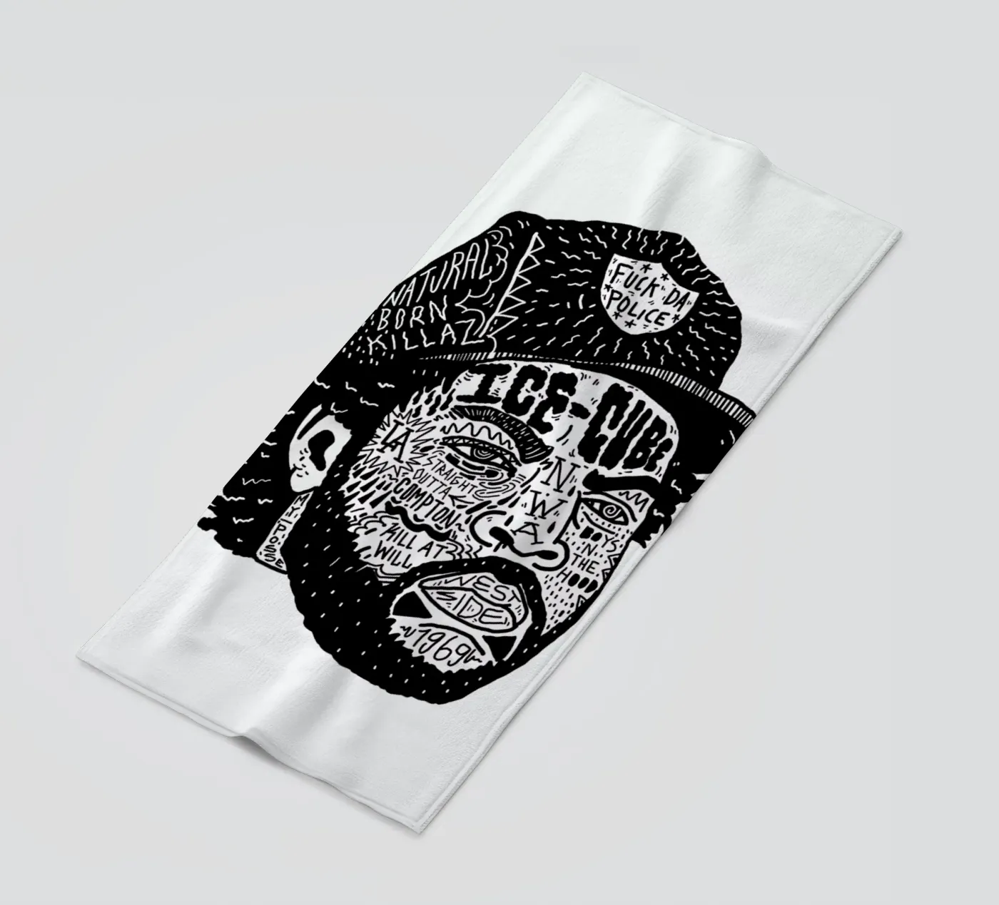 Ice Cube beach towel by Nick Cocozza