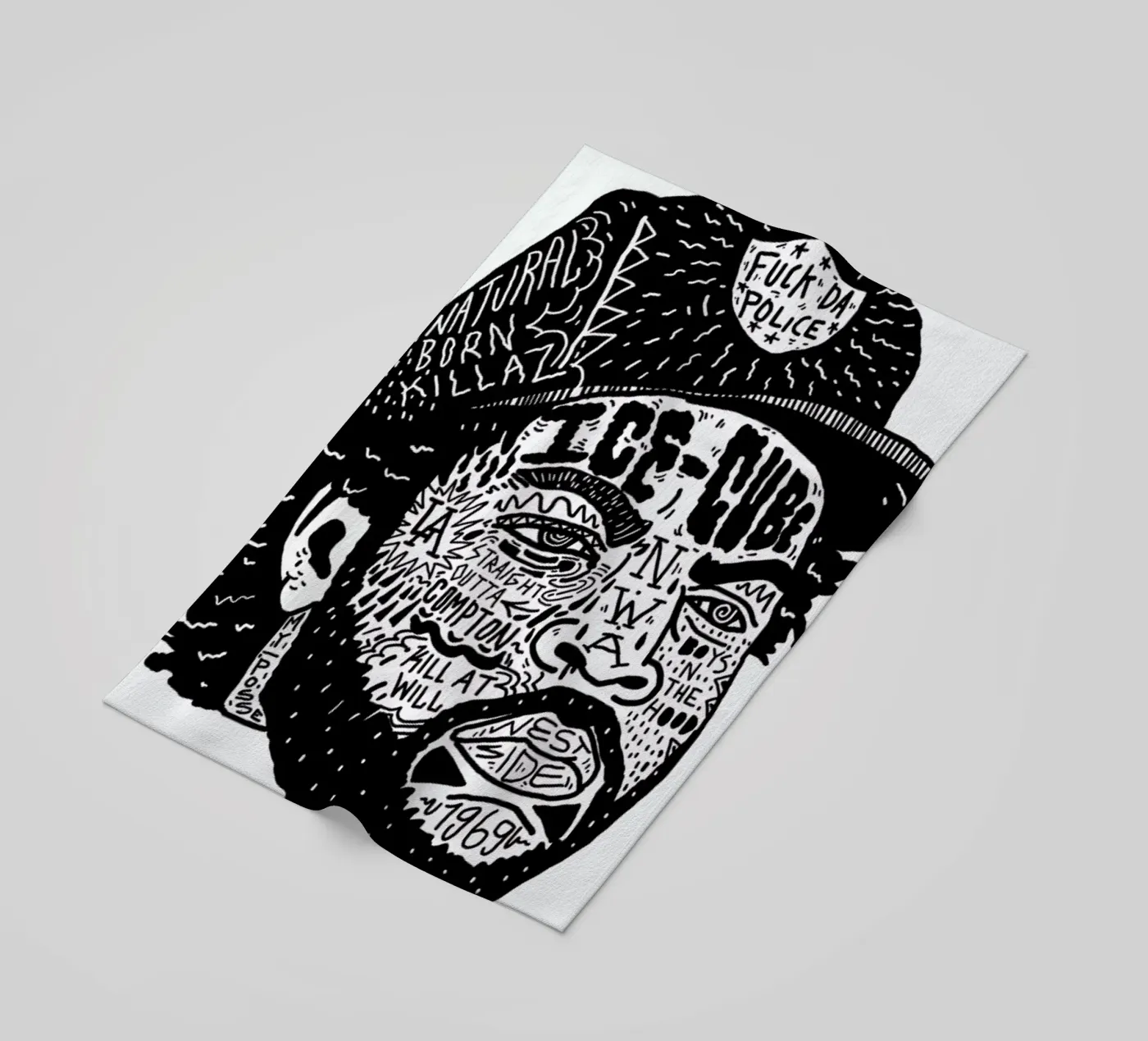 Ice Cube beach towel by Nick Cocozza
