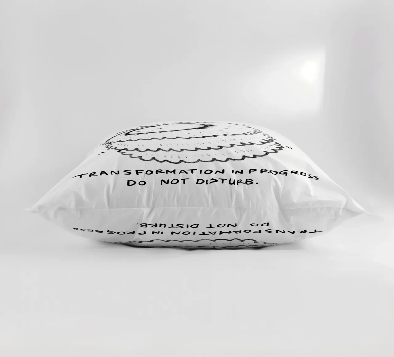 Transformation in progress, do not disturb decorative cushion by Studio Patruschka