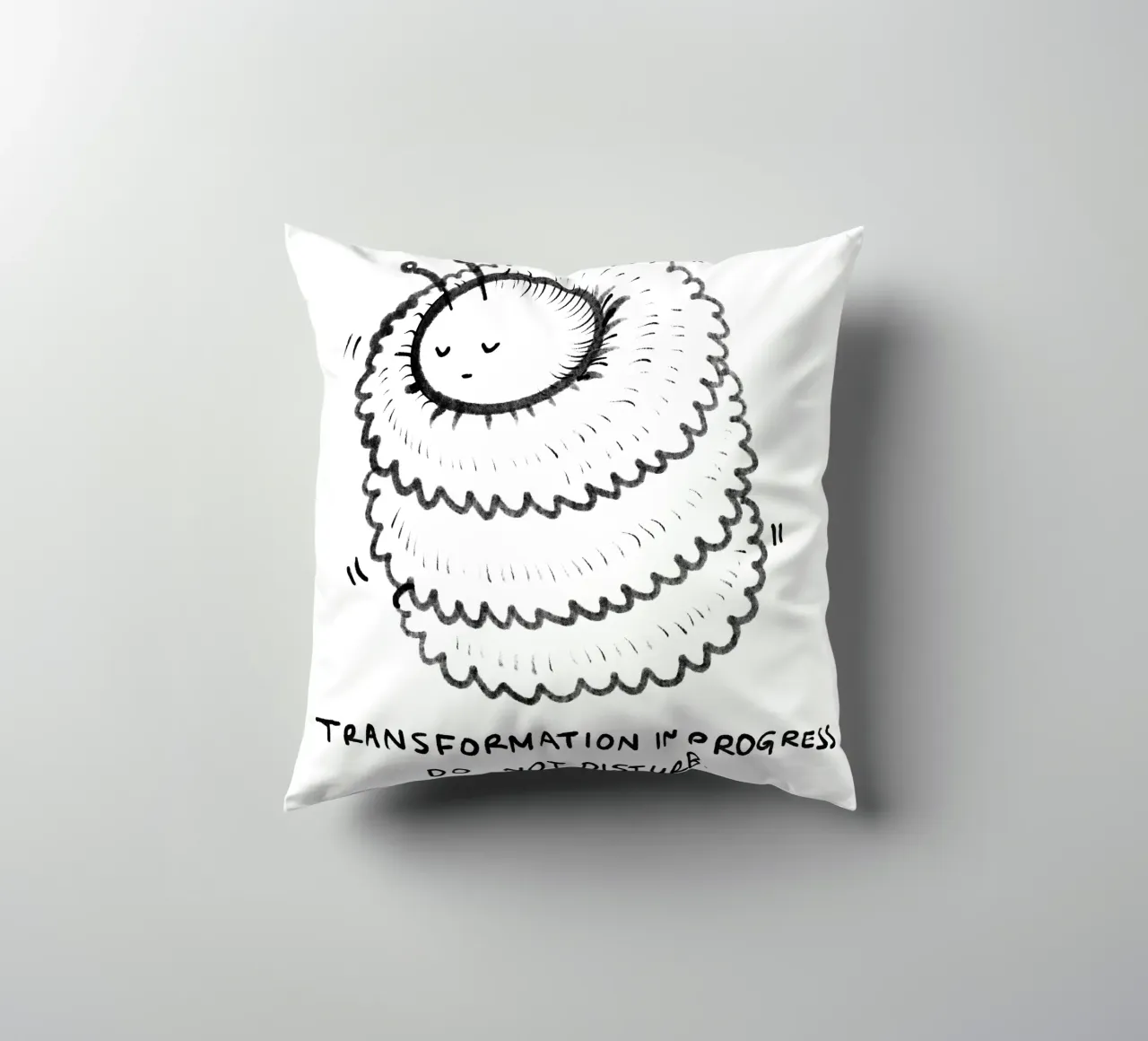 Transformation in progress, do not disturb decorative cushion by Studio Patruschka