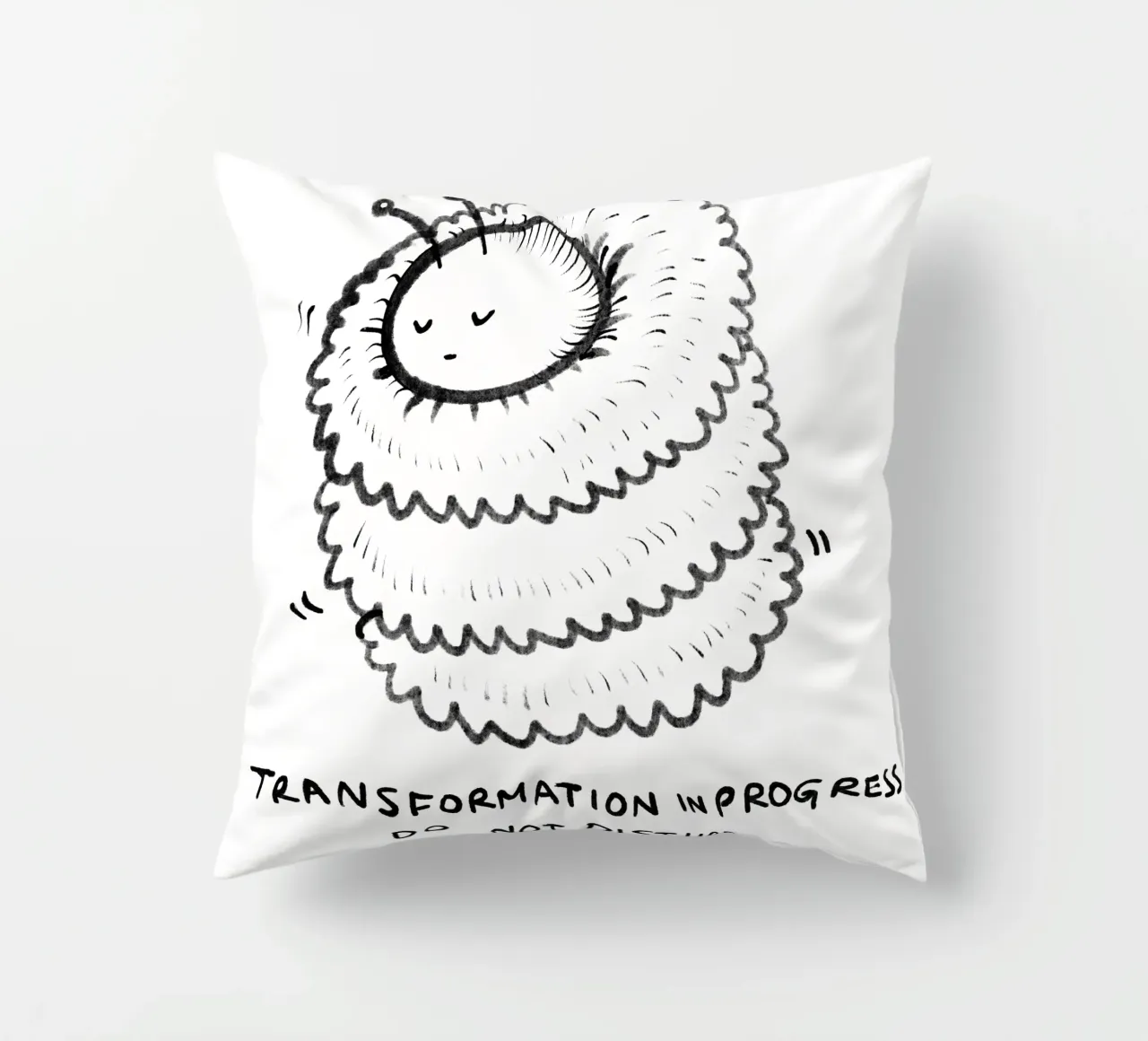 Transformation in progress, do not disturb decorative cushion by Studio Patruschka