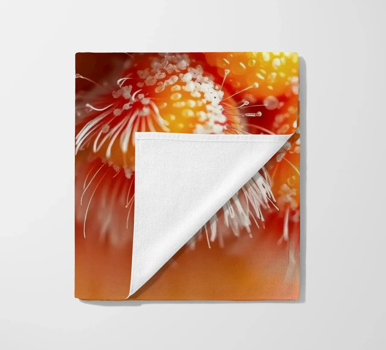 close-up of an abstract creature featuring colorful patterns beach towel by DesignDoodle