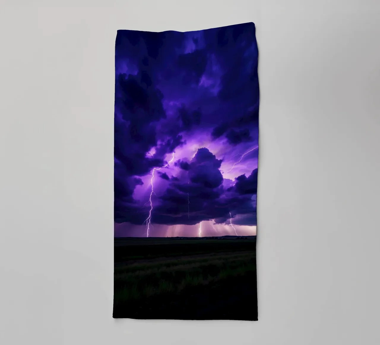 lightning storms illuminate dark purple clouds towel by DesignDoodle