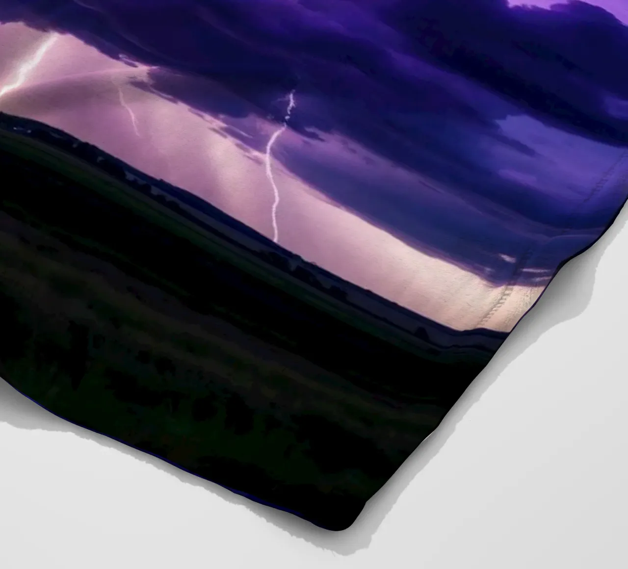 lightning storms illuminate dark purple clouds fleece blanket by DesignDoodle