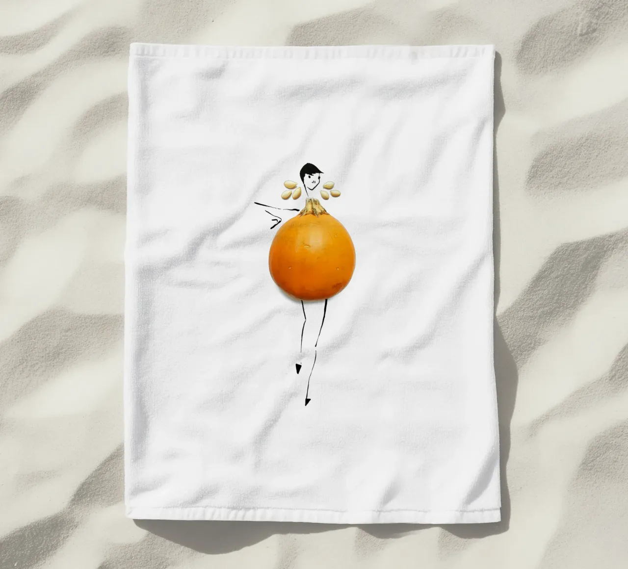 Pumpkin beach towel by Gretchen Roehrs