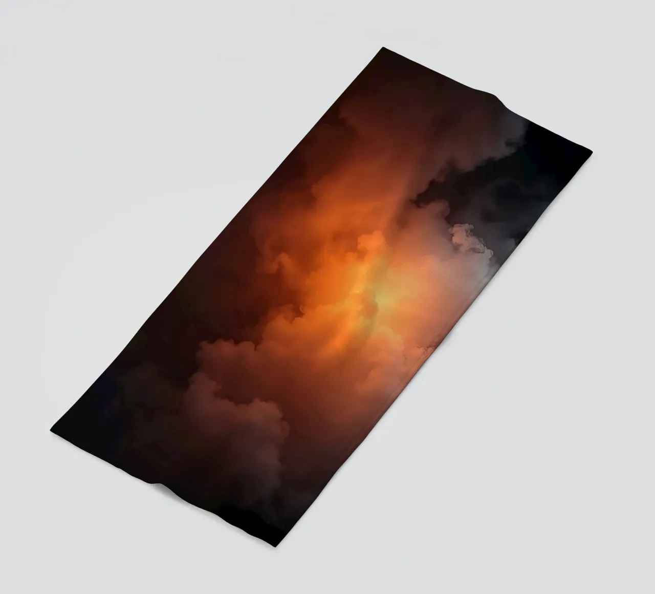 clouds with warm orange glow create a captivating background beach towel by DesignDoodle