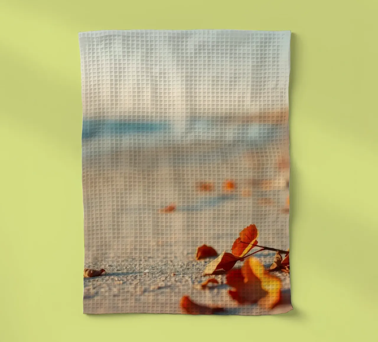 Foglie d'autunno sparse sulla spiaggia sabbiosa al tramonto canovaccio da cucina da DesignDoodle