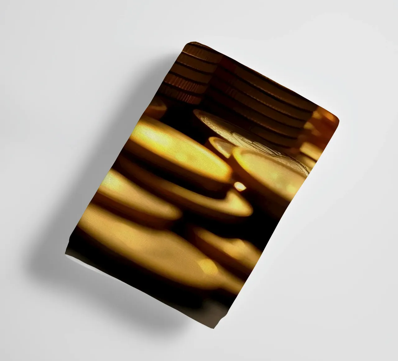 Stacks of shiny coins create a dramatic display towel by DesignDoodle