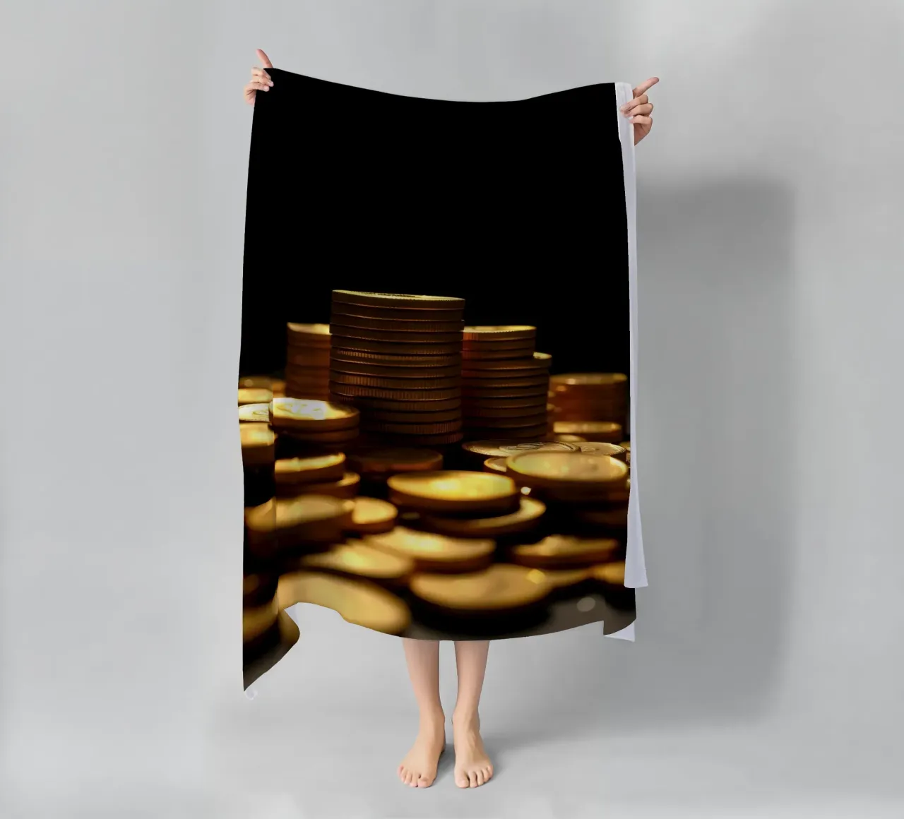 Stacks of shiny coins create a dramatic display beach towel by DesignDoodle