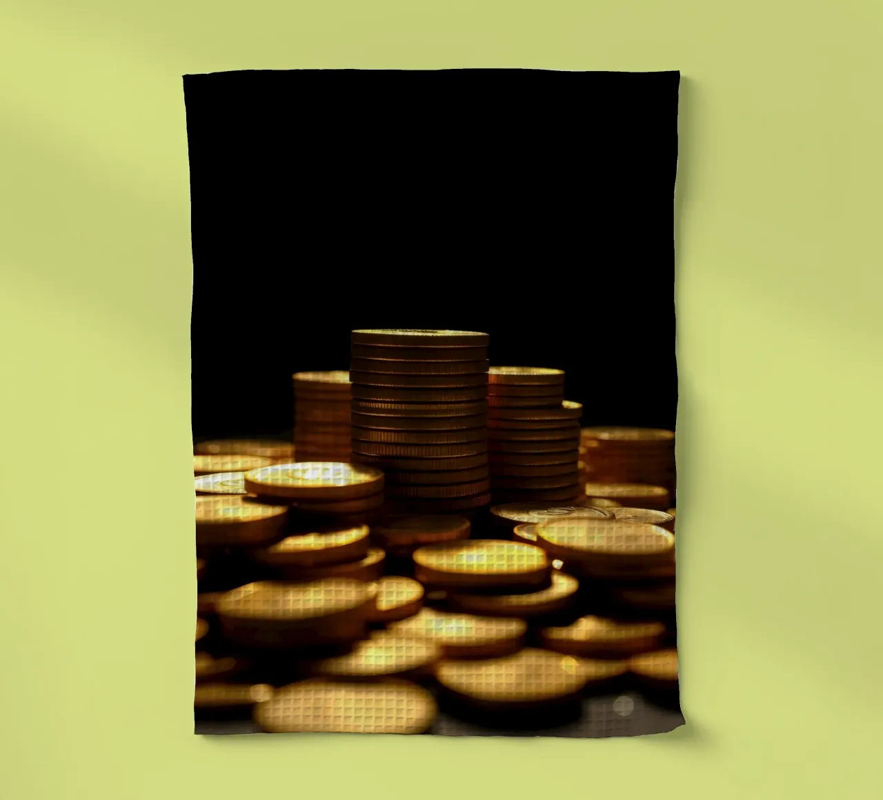 Stacks of shiny coins create a dramatic display tea towel by DesignDoodle