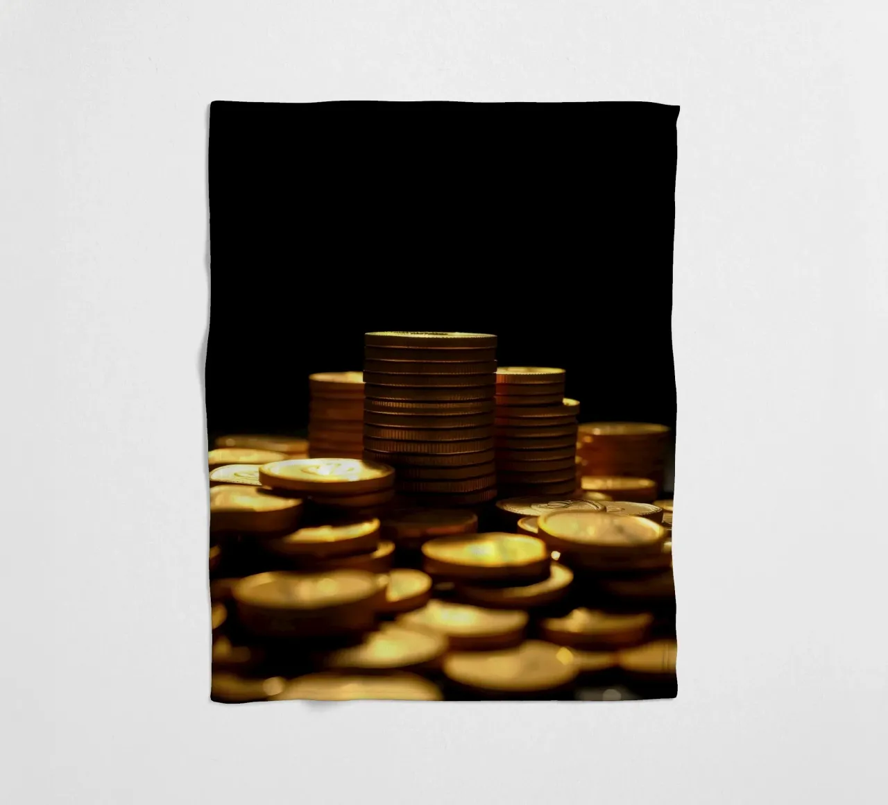 Stacks of shiny coins create a dramatic display fleece blanket by DesignDoodle