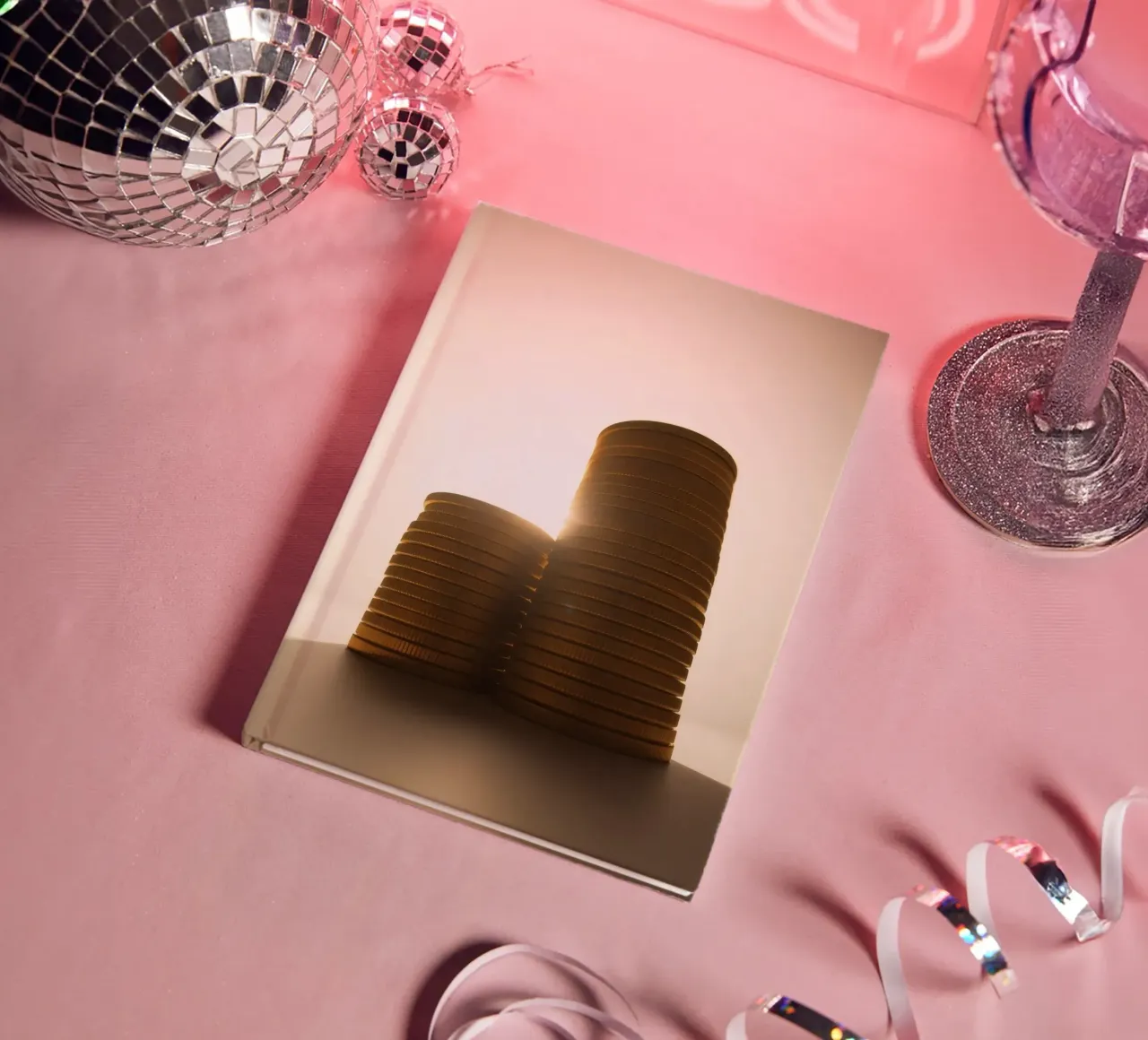 Stacks of coins glimmer highlighting investment and savings notebook by DesignDoodle
