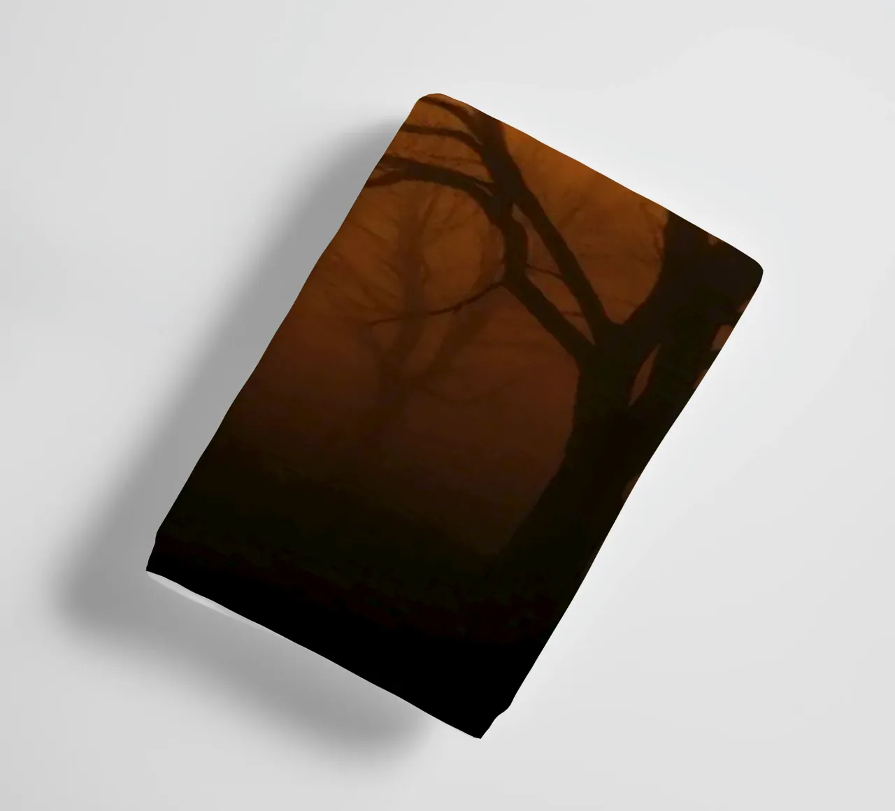 Mysterious twilight envelops a foggy landscape with silhouet towel by DesignDoodle