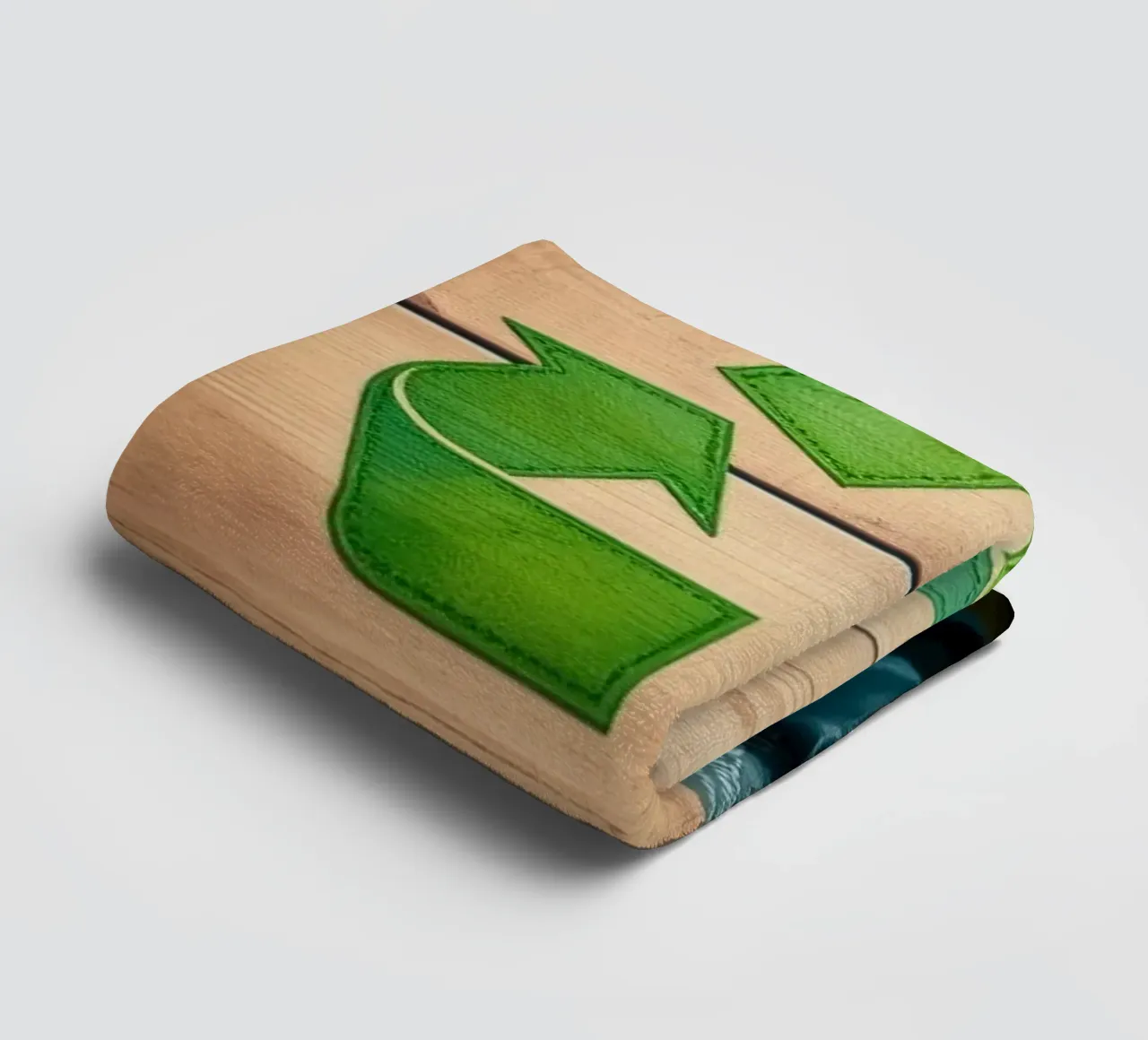 Recycling symbols surrounded by various waste materials towel by DesignDoodle