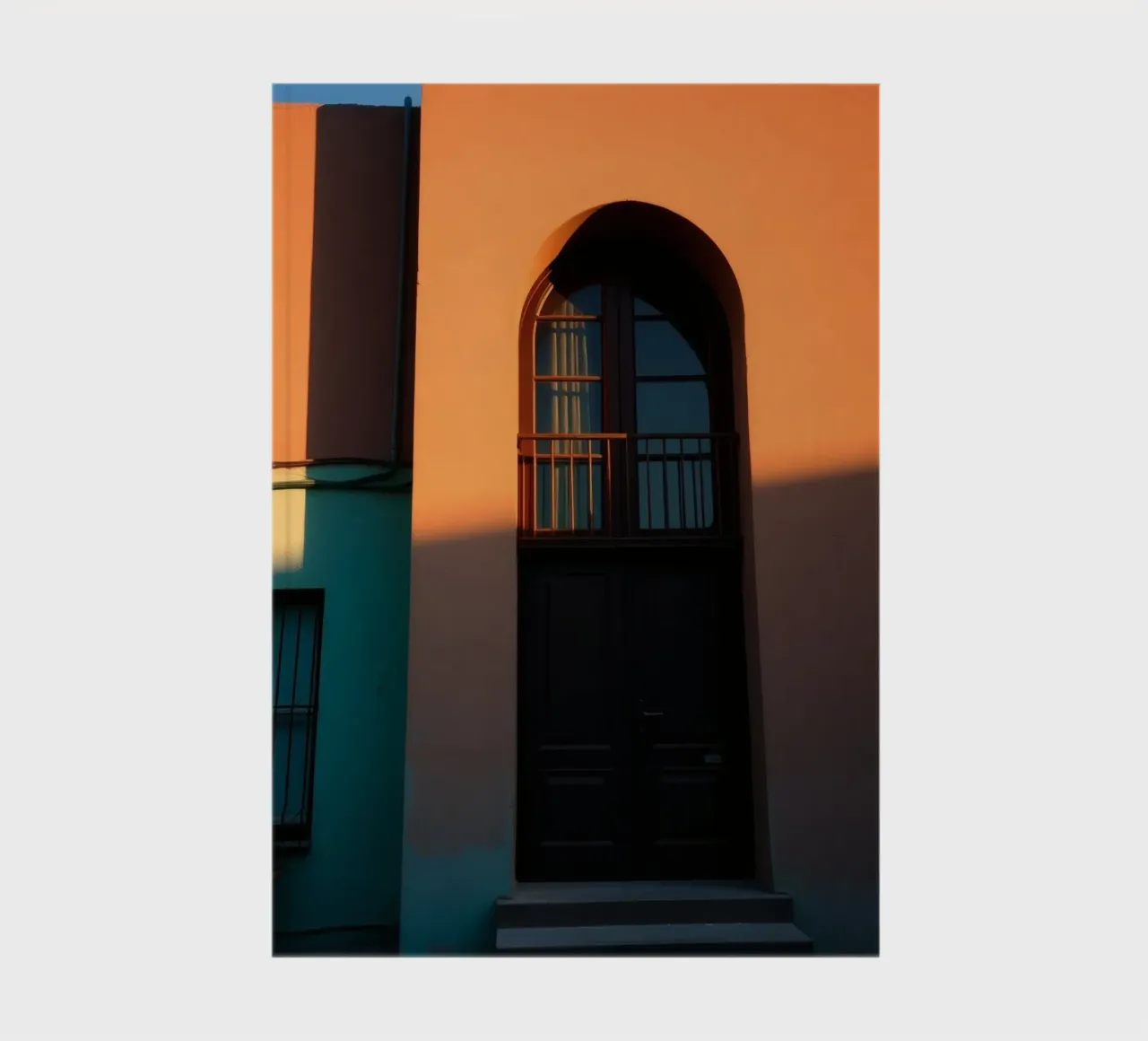 Bright evening sunlight casts shadows on a colorful building notebook by DesignDoodle