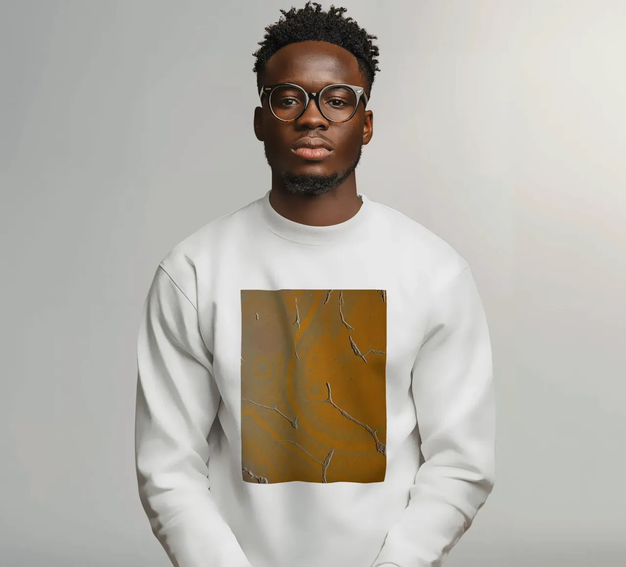 Textured surface shows cracks and patterns in warm tones sweatshirt by DesignDoodle