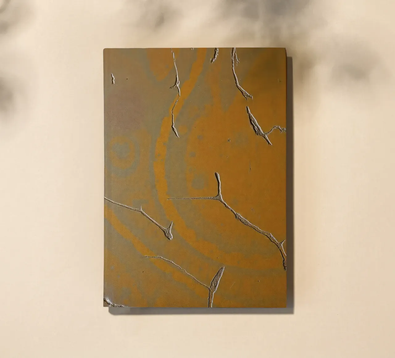 Textured surface shows cracks and patterns in warm tones notebook by DesignDoodle