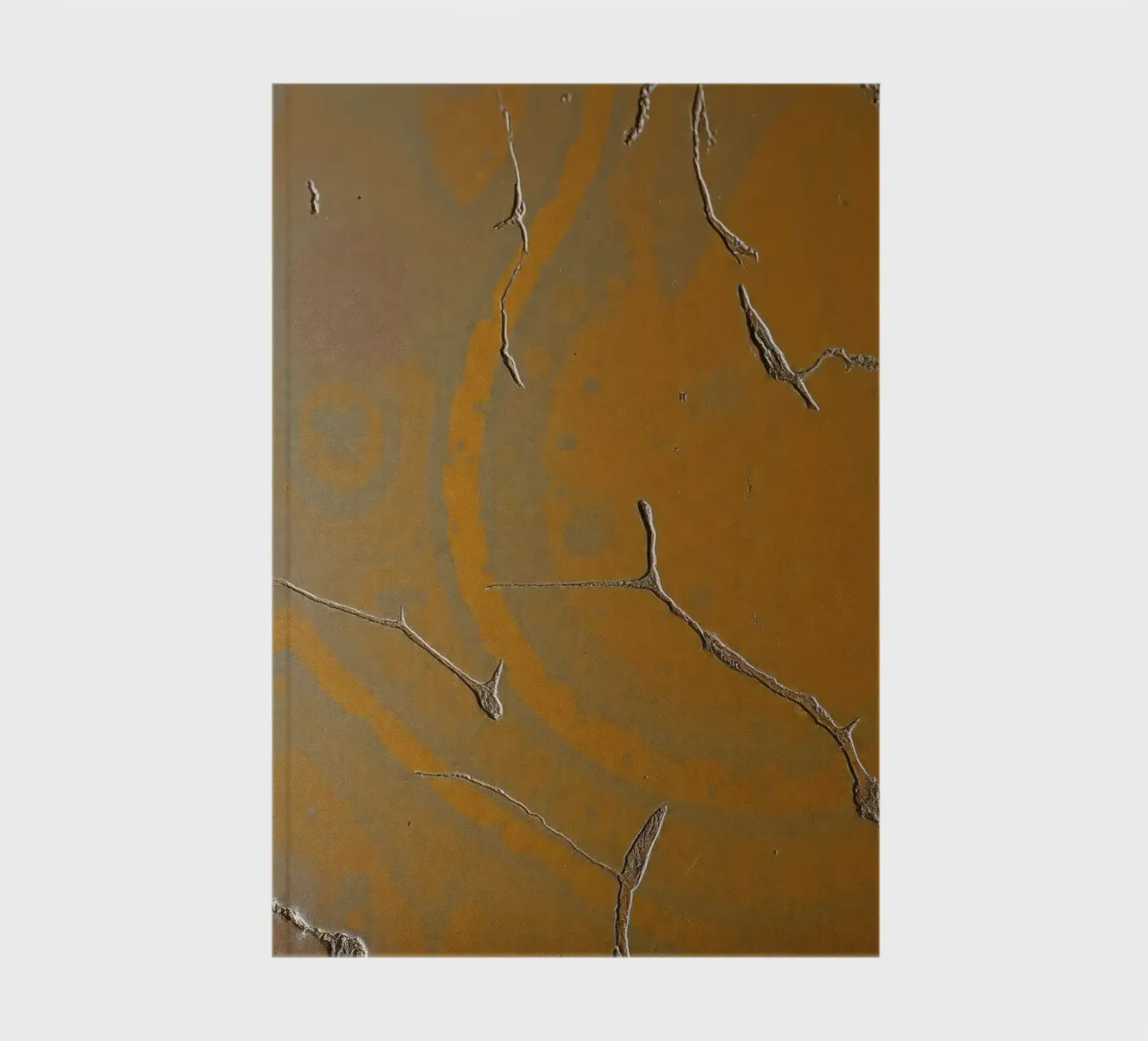 Textured surface shows cracks and patterns in warm tones notebook by DesignDoodle